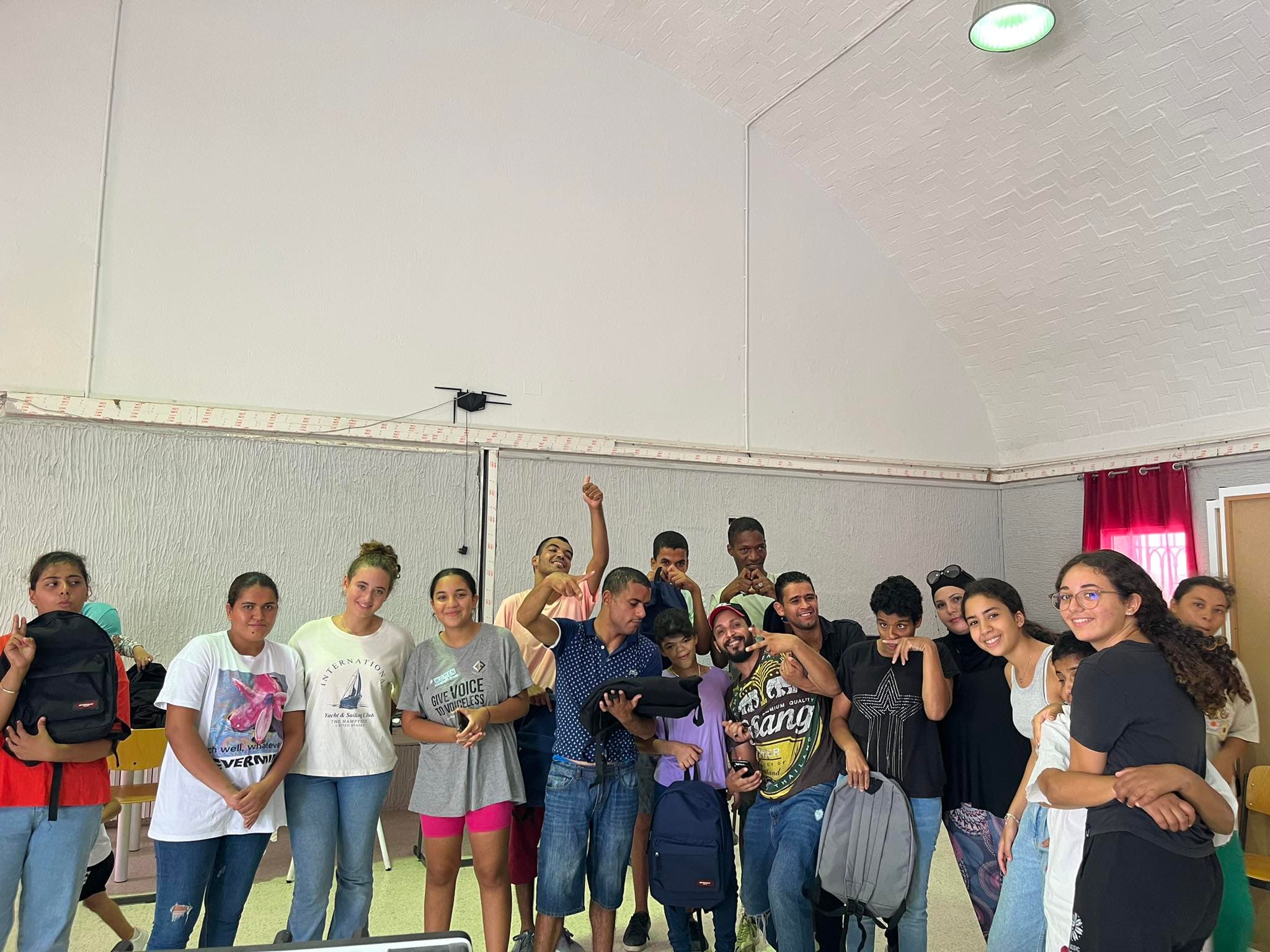 A group posing together indoors.